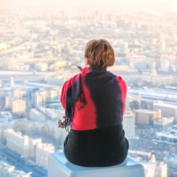 Woman Setting in an Observation Deck